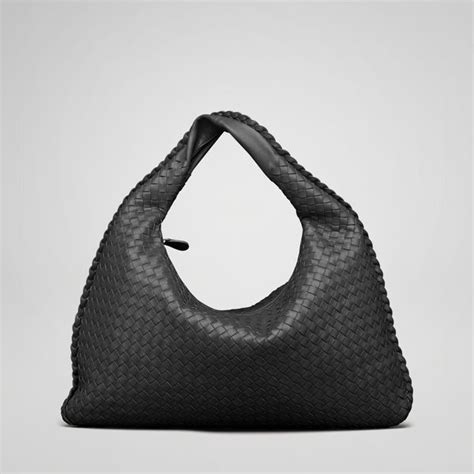 which is better to buy bottega veneta or chanel|bottega veneta handbags logo.